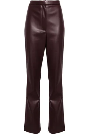 ROTATE Pantalon slim à taille haute