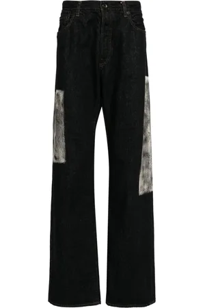 YOHJI YAMAMOTO Jean droit à empiècements