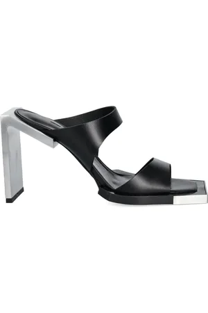 HELIOT EMIL Mules en cuir 100 mm