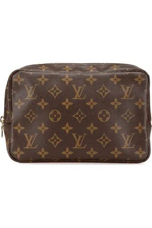 LOUIS VUITTON Pochette monogrammée Trousse Toilette 23 (2003)