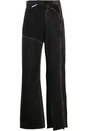 Maison Mihara Yasuhiro Jean asymétrique à taille haute