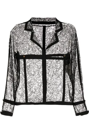 CHANEL Veste en dentelle à logo brodé (1994)