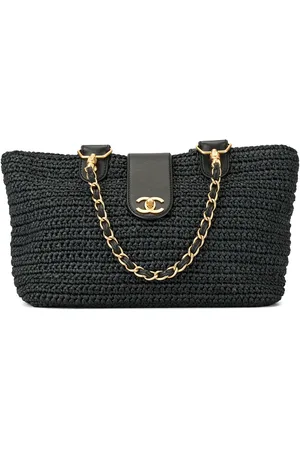 CHANEL Sac cabas à design en paille tressée