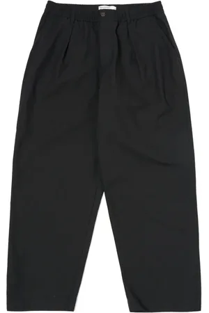 Universal Works Pantalon évasé à boutonnière
