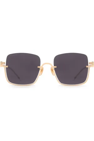Gucci Lunettes de soleil teintées à monture carrée