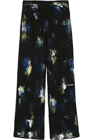 We11 Done Pantalon de jogging à imprimé Painted
