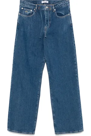 Lacoste Jean à patch logo