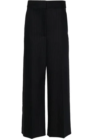 Khaite Pantalon ample à taille-haute