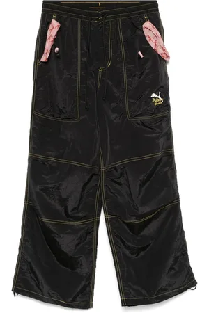PUMA X KidSuper pantalon à logo imprimé