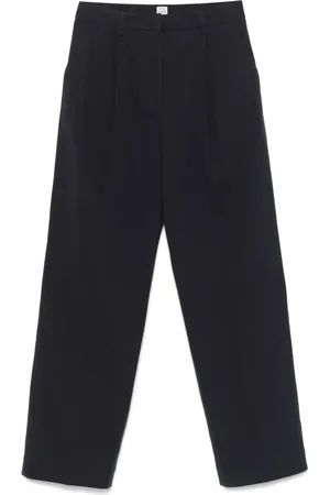 Totême Pantalon à design plissé