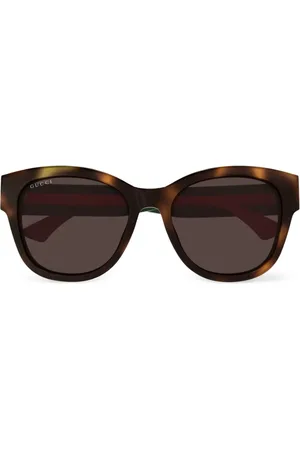 Gucci Lunettes de soleil à monture papillon