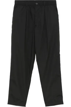 Universal Works Pantalon de jogging à design plissé