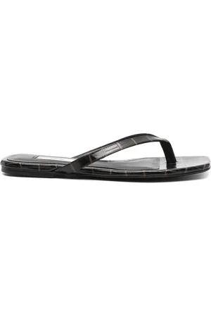 Totême Tongs à effet peau de crocodile