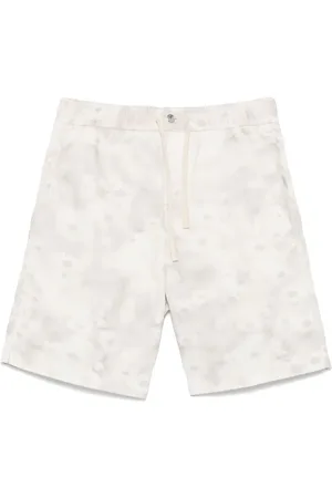 Maison Kitsuné Short en jean à imprimé graphique