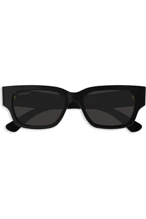 Gucci Lunettes de soleil à logo imprimé