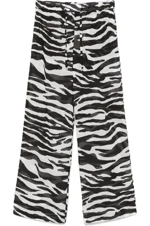 The Attico Pantalon transparent à imprimé zébré