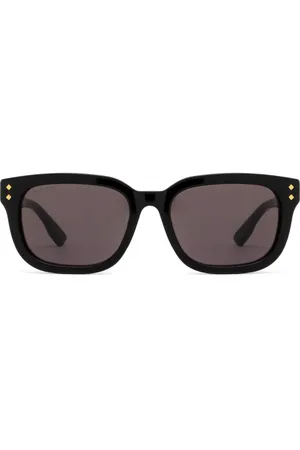 Gucci Lunettes de soleil à logo imprimé