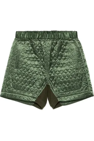 NOIR KEI NINOMIYA Short court à design matelassé