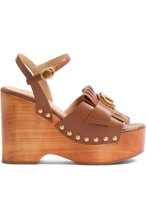 VALENTINO GARAVANI Mules frangées à détail VLogo 120 mm