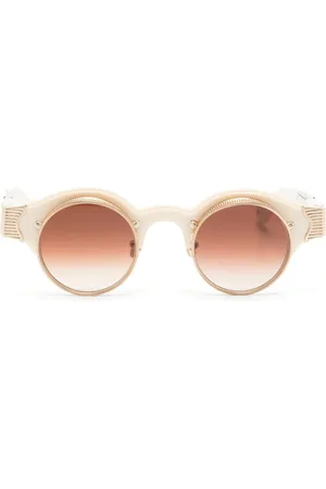 MATSUDA Lunettes de soleil à monture ronde gravée
