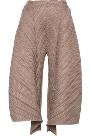 PLEATS PLEASE ISSEY MIYAKE Pantalon à coupe évasée