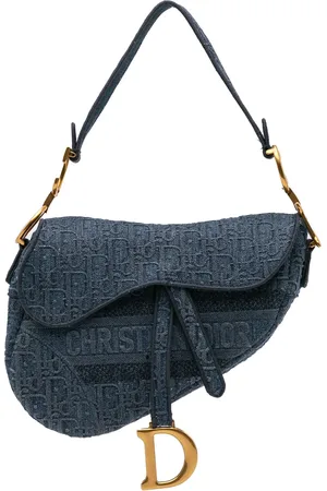 Dior Sac porté épaule Saddle Bag en jean brodé à motif Oblique (2019)