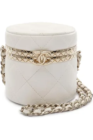 CHANEL Mini trousse de toilette Matelassé Round Case en peau d
