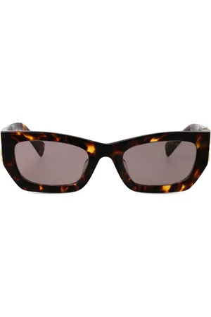 Miu Miu Lunettes de soleil à monture effet écaille de tortue