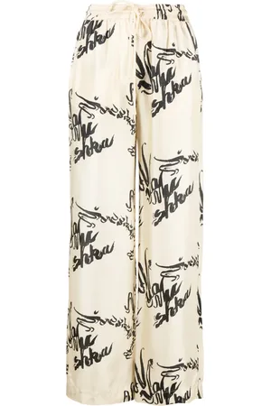 Nanushka Pantalon en soie Jarine à fleurs