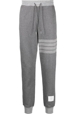 Thom Browne Pantalon de jogging à détail 4 bandes signature