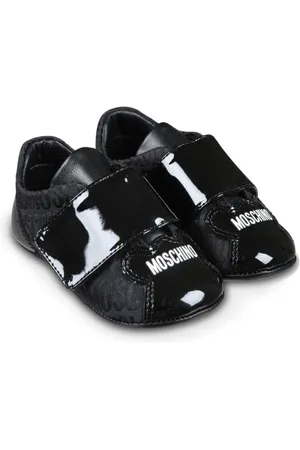 Moschino Baskets en cuir à logo imprimé