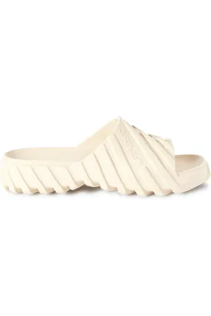 OFF-WHITE Claquettes embossées Exploration