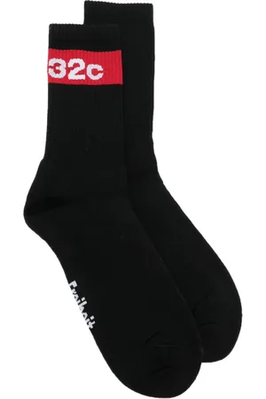 032c Chaussettes en maille à logo imprimé