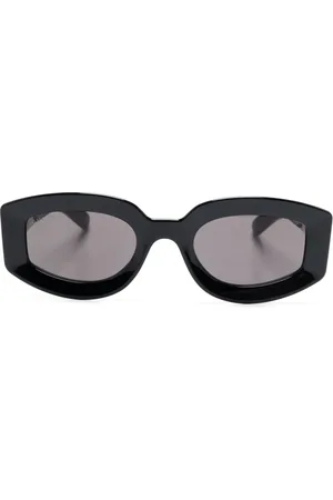 Gucci Lunettes de soleil à logo embossé
