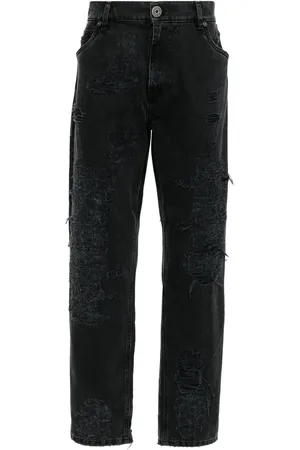 Balmain Jean slim à effet usé