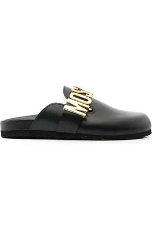 Moschino Mules en cuir à plaque logo