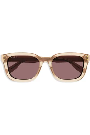 Gucci Lunettes de soleil à logo imprimé