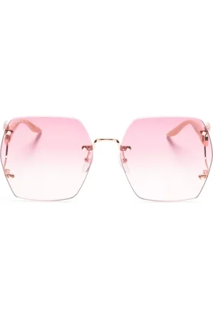 Gucci Lunettes de soleil à monture géométrique