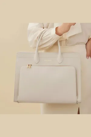 Isabel Bernard Sacs de Voyage et Business, Honoré Nadine cream calfskin leather handbag with en