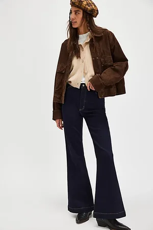 Rollas Jeans Flare East Coast de en , pour femme taille: 29 chez Free People