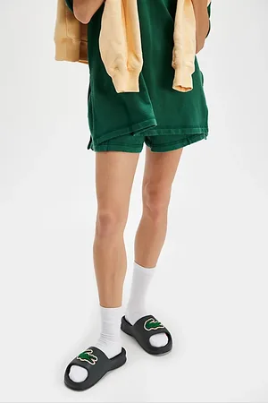 Lacoste Claquettes Serve 2.0 en , pour femme taille: US 6 chez Free People