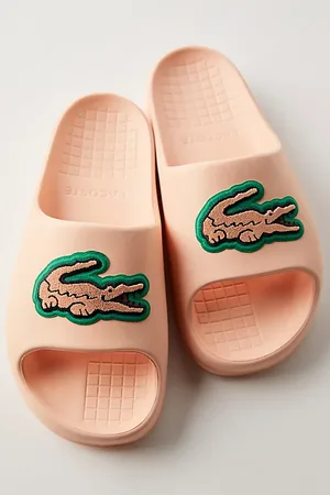 Lacoste Claquettes Serve 2.0 en , pour femme taille: US 10 chez Free People