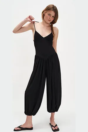 Norma Kamali Kenny Jumpsuit en , pour femme chez Free People