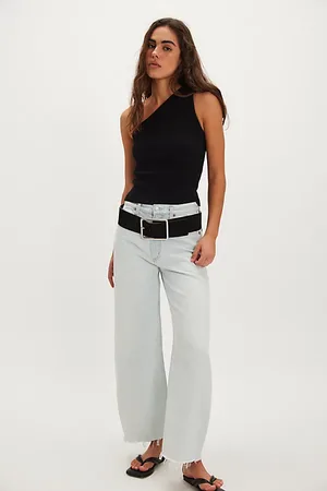 AGOLDE Jeans Low Curve Fray en , pour femme taille: 31 chez Free People