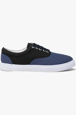 Gémo Baskets homme en toile bicolores et à lacets