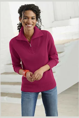 COLLECTION L. Pull en maille côtelée col montant à glissière -