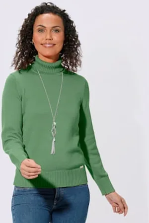COLLECTION L. Pull femme col roulé manches ourlet avec finitions côtelées -