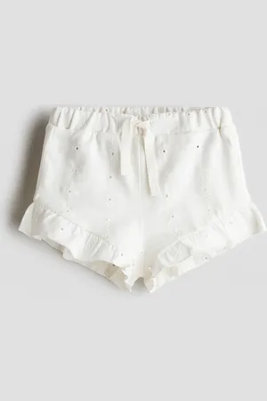 H&M Short en jersey avec broderie anglaise