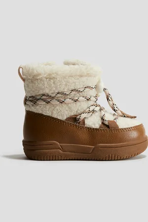 H&M Bottines de neige en tissu Teddy bear