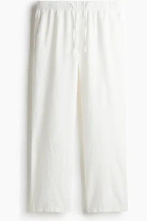 H&M Pantalon Relaxed Fit en lin mélangé
